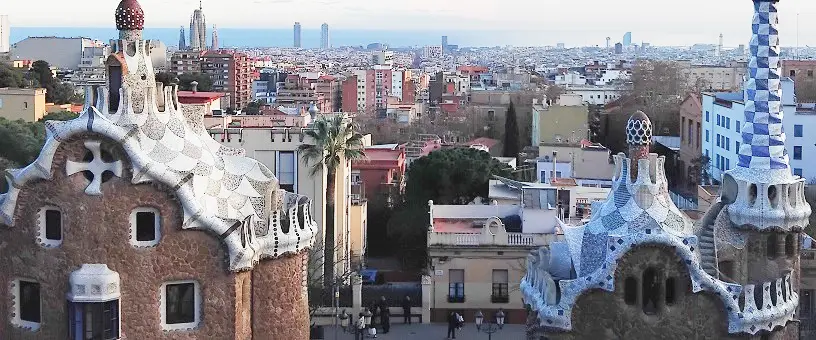 Gaudí's pancake-like houses in Park Güell - and the view over Barcelona city